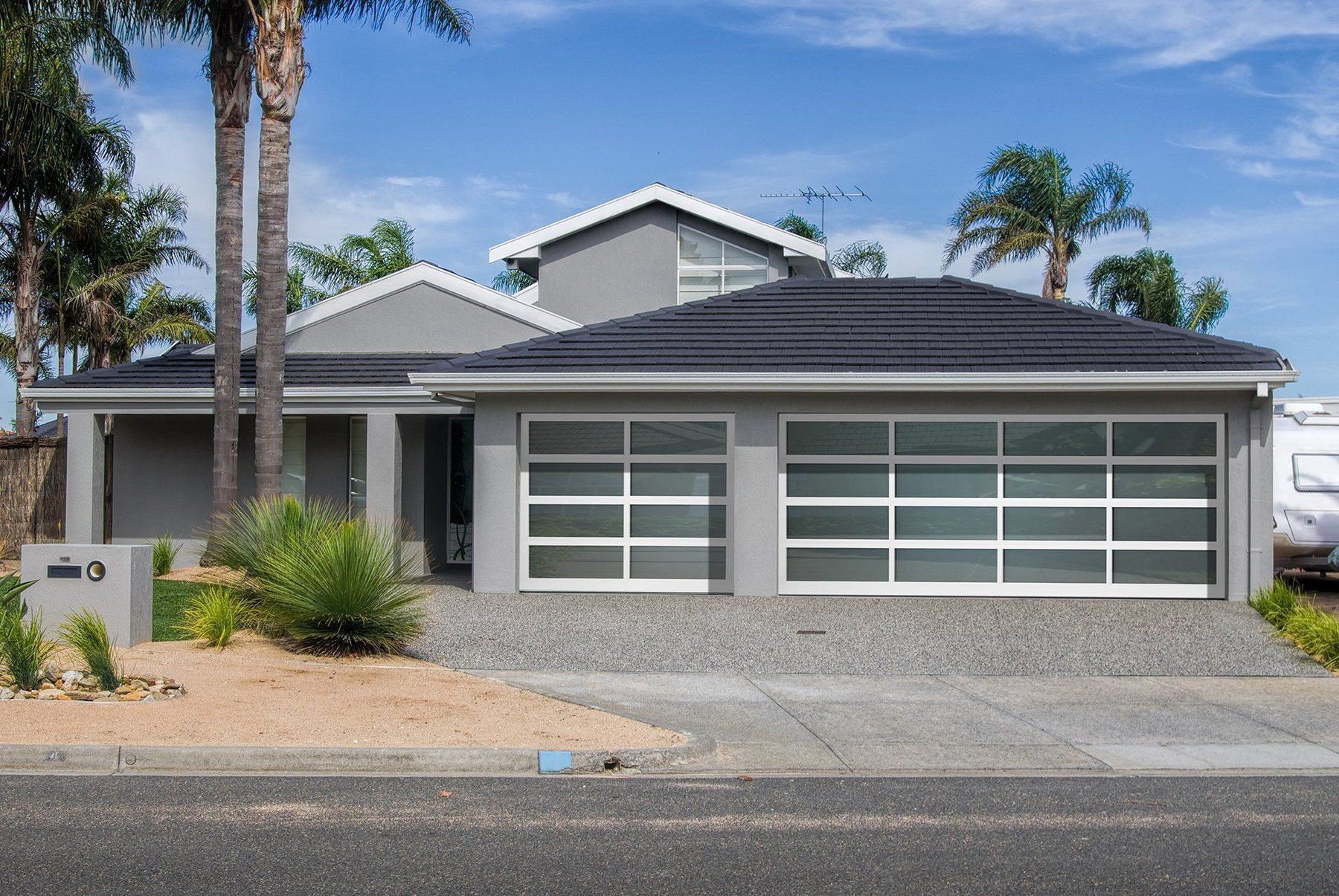 Haas Door modern aluminum and glass residential garage doors
