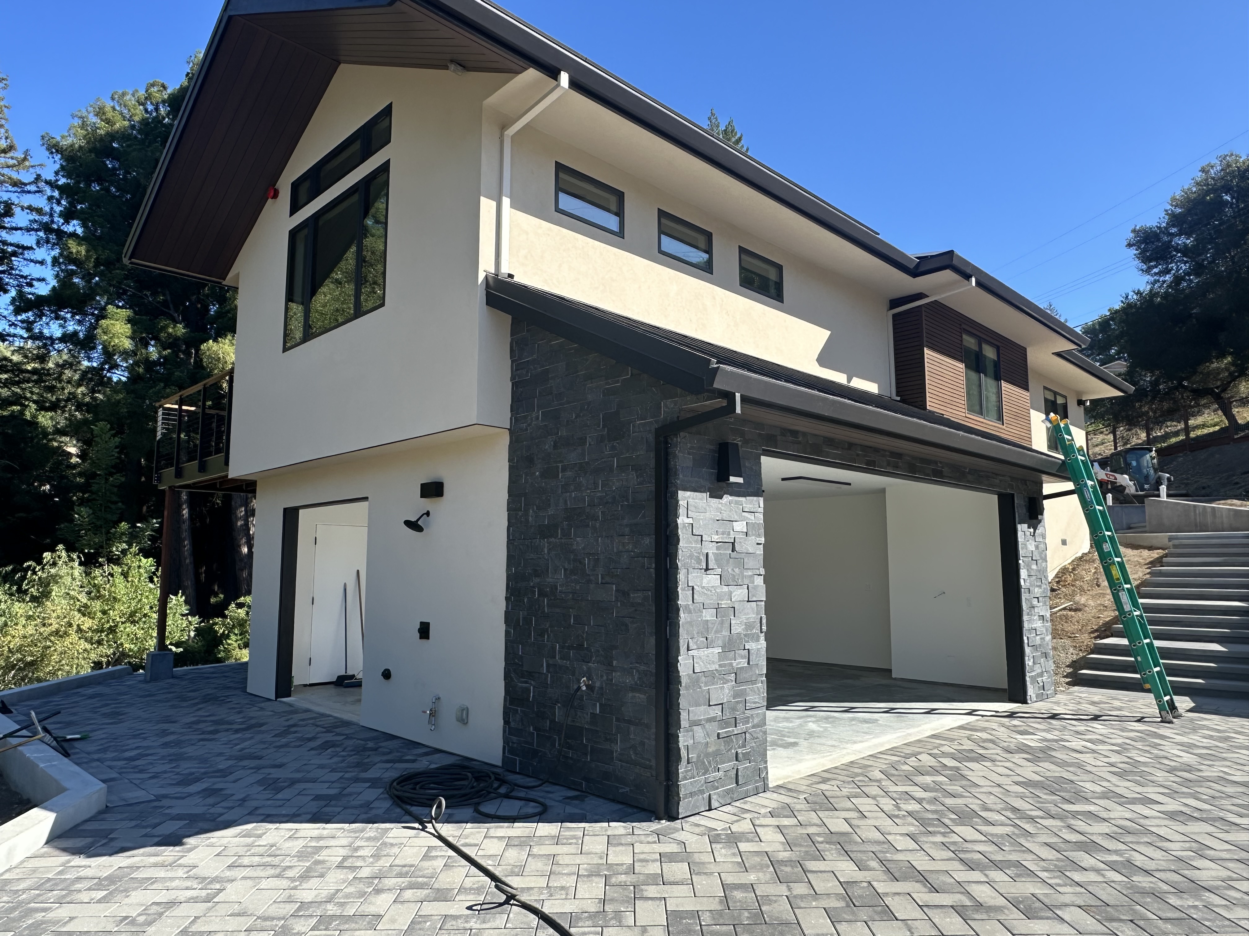 Before modern full-view glass garage door installation